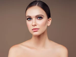 a portrait of a young woman with sculpted jaw