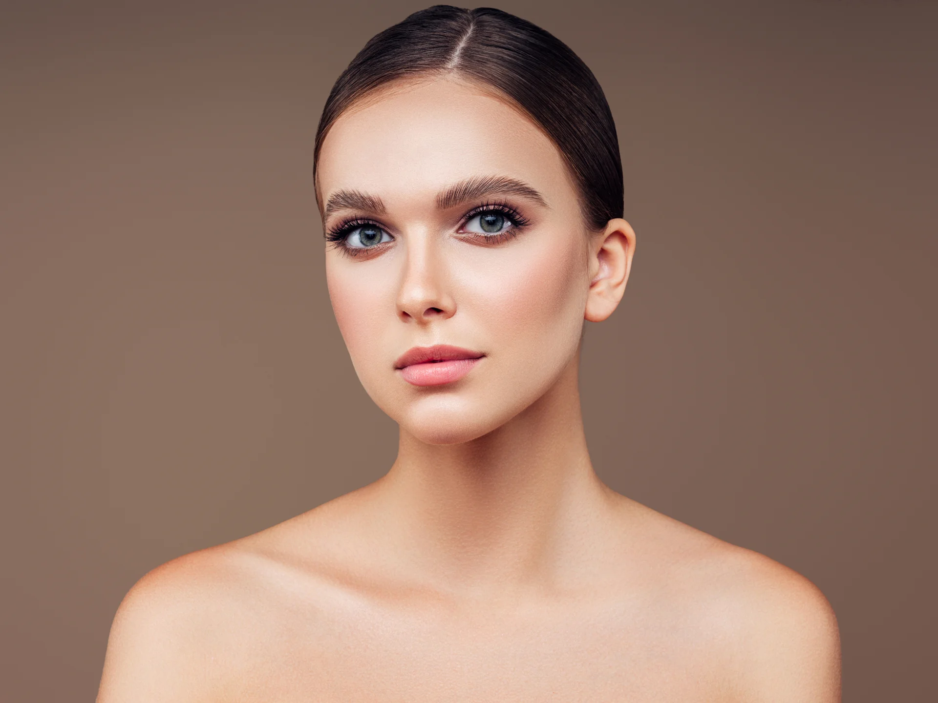 a portrait of a young woman with sculpted jaw