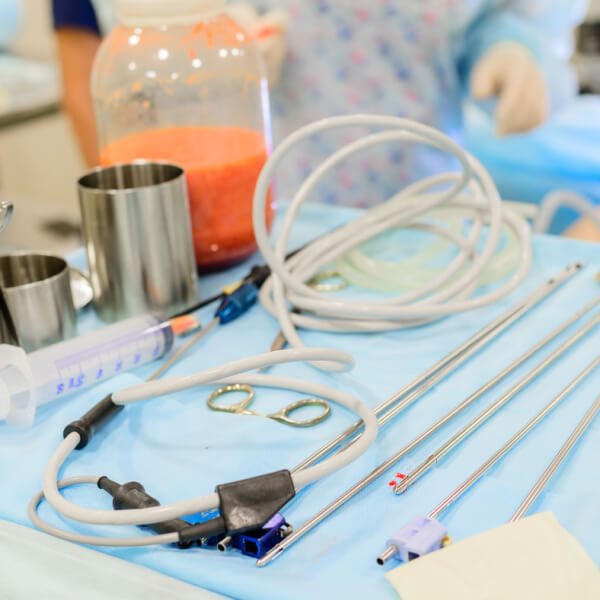Surgical equipment for back fat removal in an operating room.