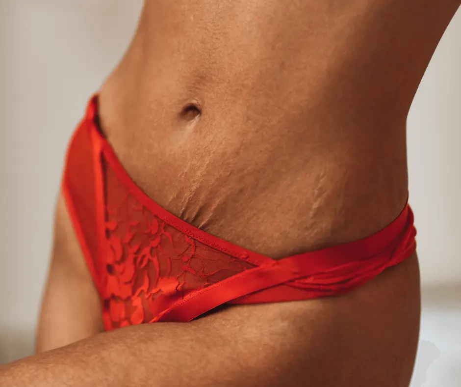 Large Volume: A large volume of people lounging on the beach, one woman stands out in a vibrant red bikini.
Important Keywords: A woman wearing a red bikini catches everyone's attention.