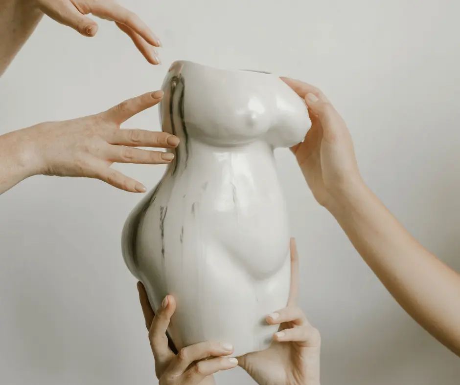 A group of hands reaching up to a vase, with no association to PCOS or liposuction.
