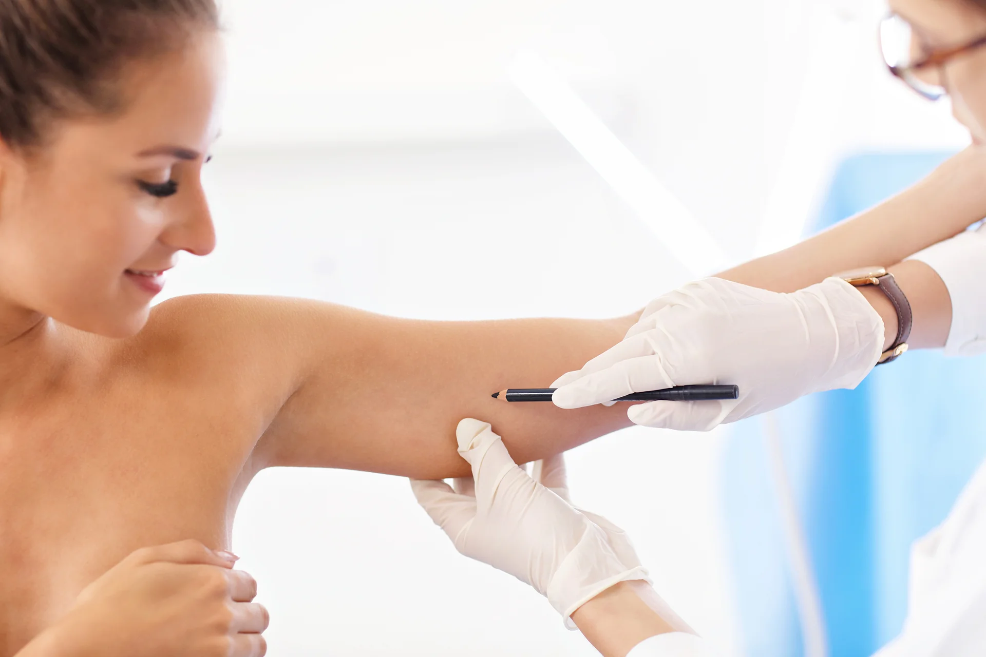 A Woman Getting Arm Lipo