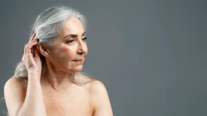 An old woman's face after Chin Fat Reduction for patients over 60.