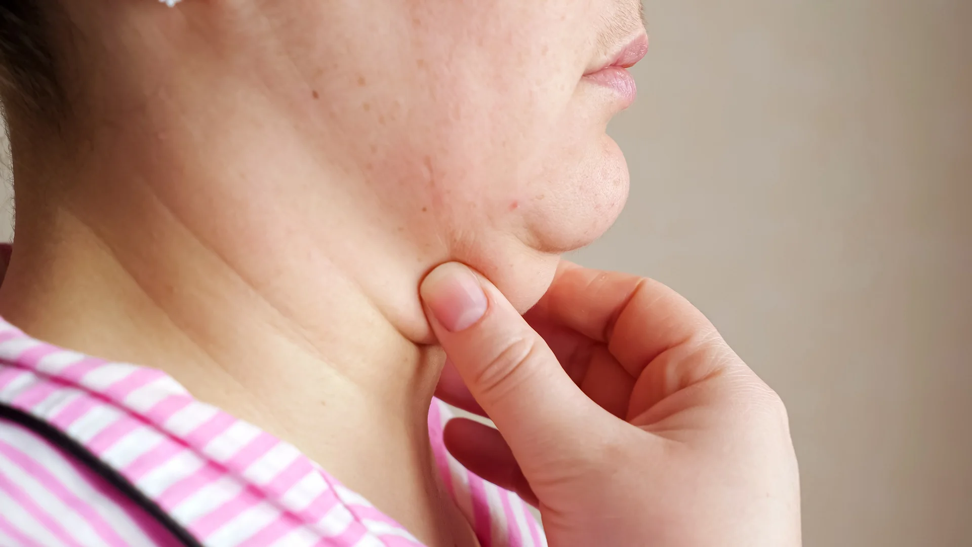A double chin of a woman.